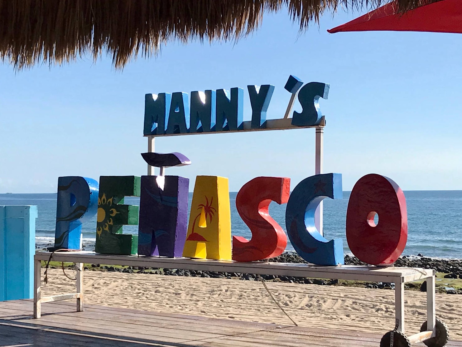 Manny's Beach Bar sign 